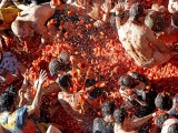 Participate in the World’s Biggest Food Fight at La Tomatina Festival in Spain